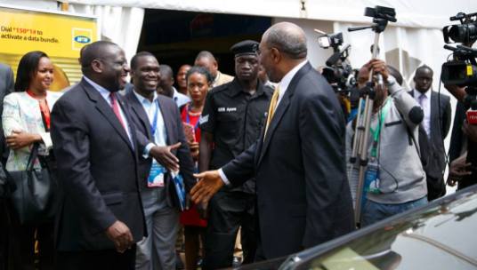Kivumbi Earnest Benjamin with Prime Minister Dr Ruhaka Rugunda (3)